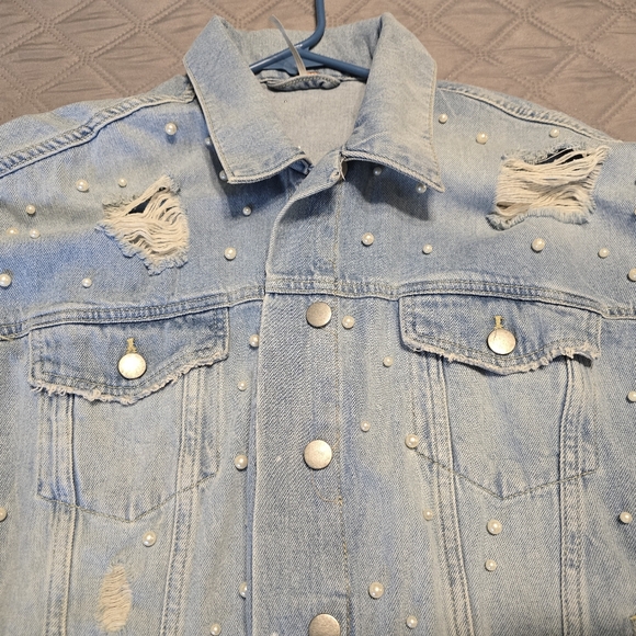 Free People classic cut denim jacket adorned with pearl accents. - Picture 3 of 9